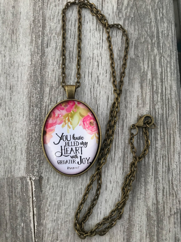 Vintage Bronze Oval Glass Pendant with Floral Background and Scripture Excerpt Psalm4:7