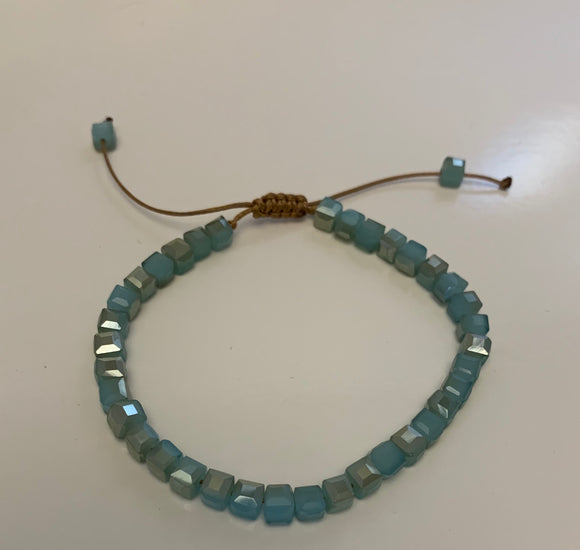 Adjustable blue beaded bracelet