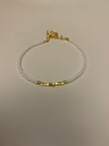 White and Gold single strand seed bead bracelet