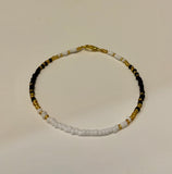 White Gold and Black single strand seed bead bracelet